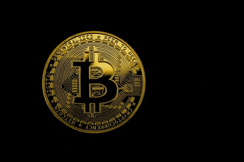Ethereum (ETH) and BNB cryptocurrency coins side by side