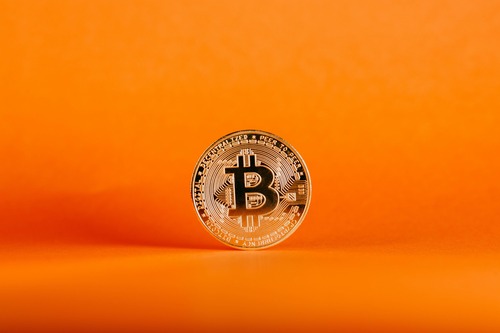 Person reviewing an Ethereum to Bitcoin exchange on a laptop