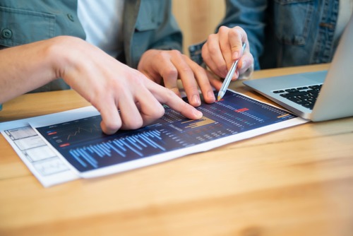 Person reviewing an Ethereum to Solana exchange on a laptop