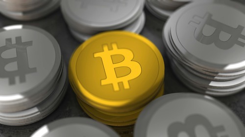 Ethereum (ETH) and Solana (SOL) cryptocurrency coins side by side
