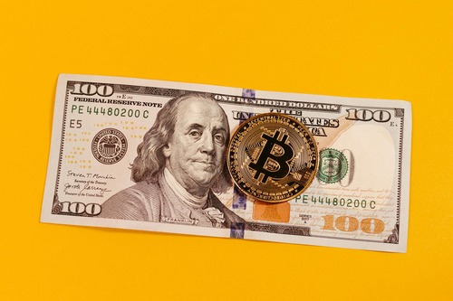 Person reviewing an Ethereum to USD Coin exchange on a smartphone