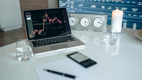 Ethereum (ETH) and Tether (USDT) cryptocurrency coins side by side