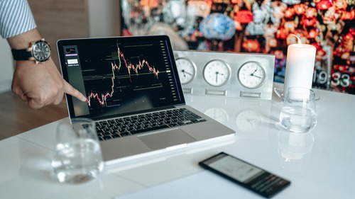 USD Coin (USDC) and Ethereum (ETH) cryptocurrency coins side by side